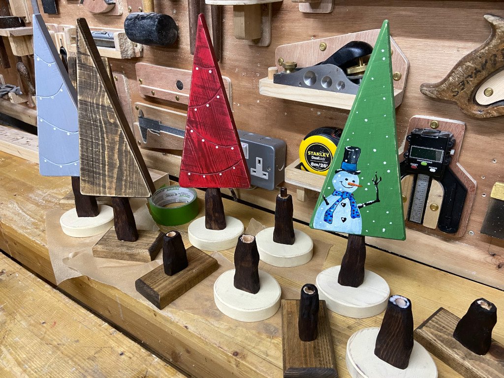 Colourful wooden trees in production