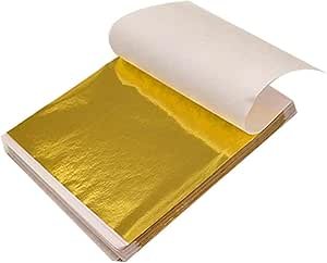 A book of gold leaf sheets with the top sheet exposed.