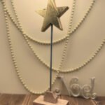 A floating Christmas Star made from Oak and finished in gold leaf