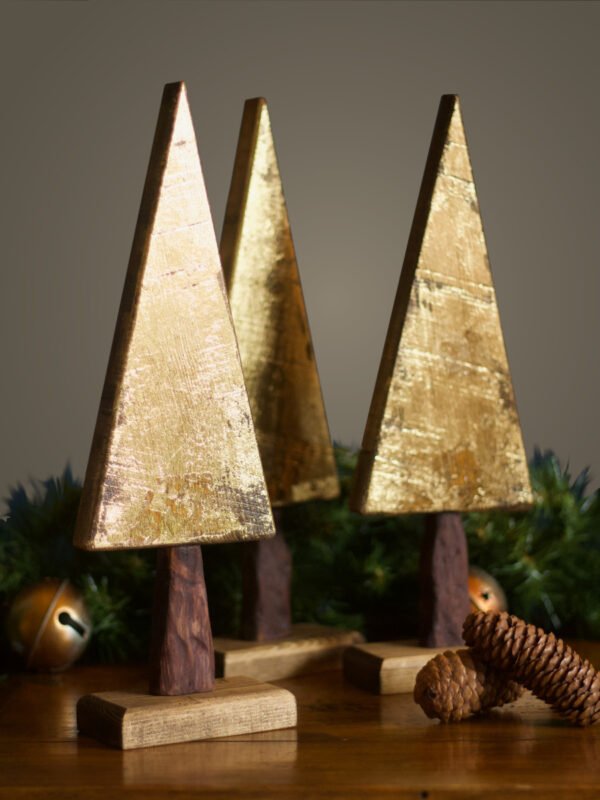 3 wooden tree ornaments in gold leaf finish.