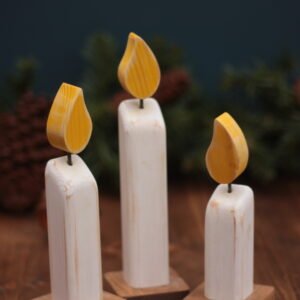 A set of 3 wooden Christmas decoration candles in a rustic style.