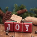 A set of rustic Christmas blocks with a Joy motif.