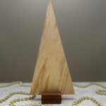 A contemporary tree ornament made from Ash.