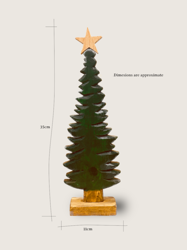 A carved christmas tree decoration with dimensions