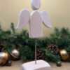 A floating Christmas Angel decoration handmade from Oak