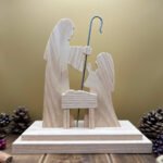 A nativity scene with Joseph, Mary and Baby Jesus made form Ash.