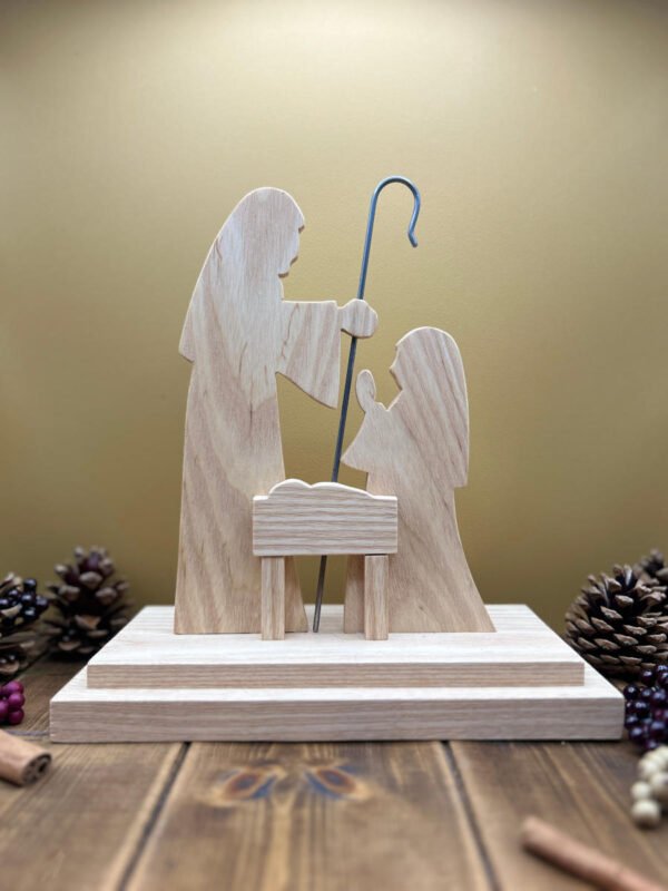 A nativity scene with Joseph, Mary and Baby Jesus made form Ash.