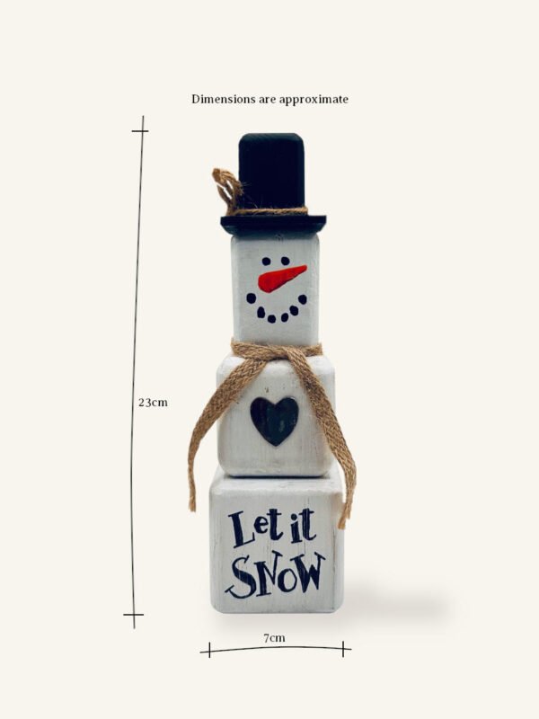 A wooden snowman decoration with dimesions.