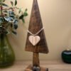 A love themed Christmas tree ornament made from wood