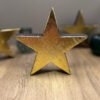 A wooden star made from recycled materials