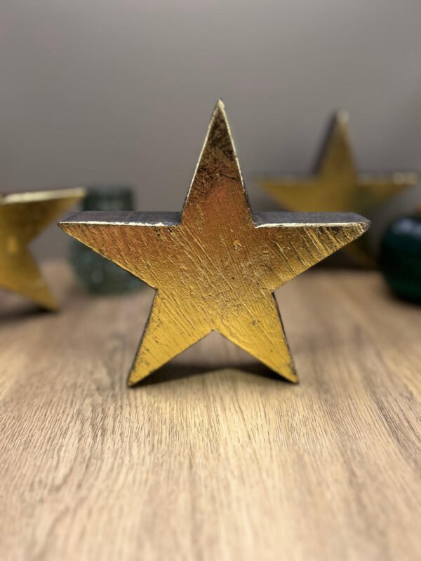 A wooden star made from recycled materials