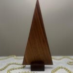 A contemporary tree ornament made from walnut.