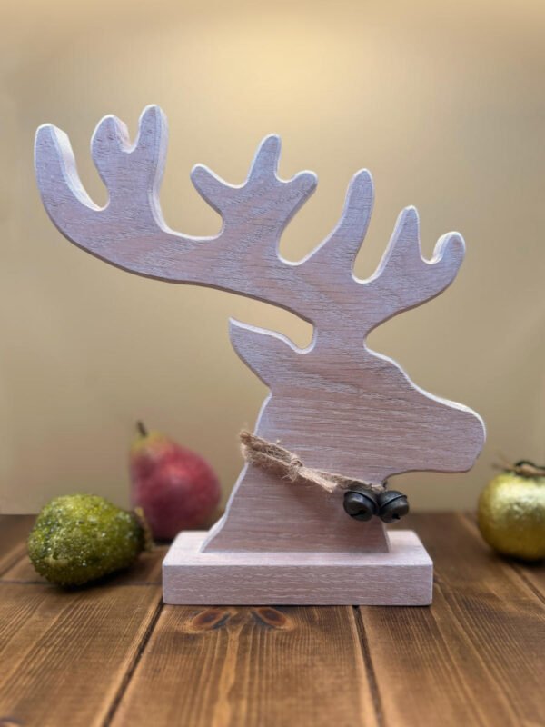A Reindeer decoration featuring head and antler is a Limed Oak finish.