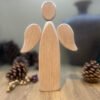 A wooden angel christmas decoration
